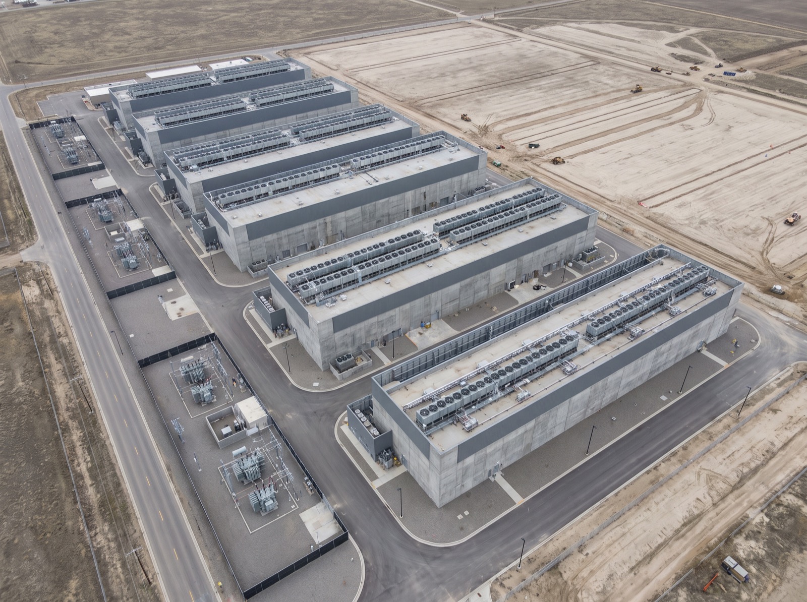 A hyperscale data center campus with its own substation under construction