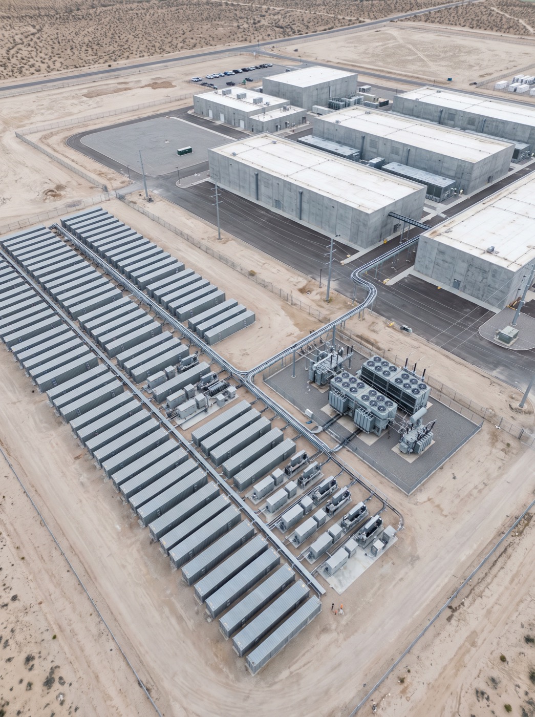 Battery energy storage containers and a substation beside a data center campus