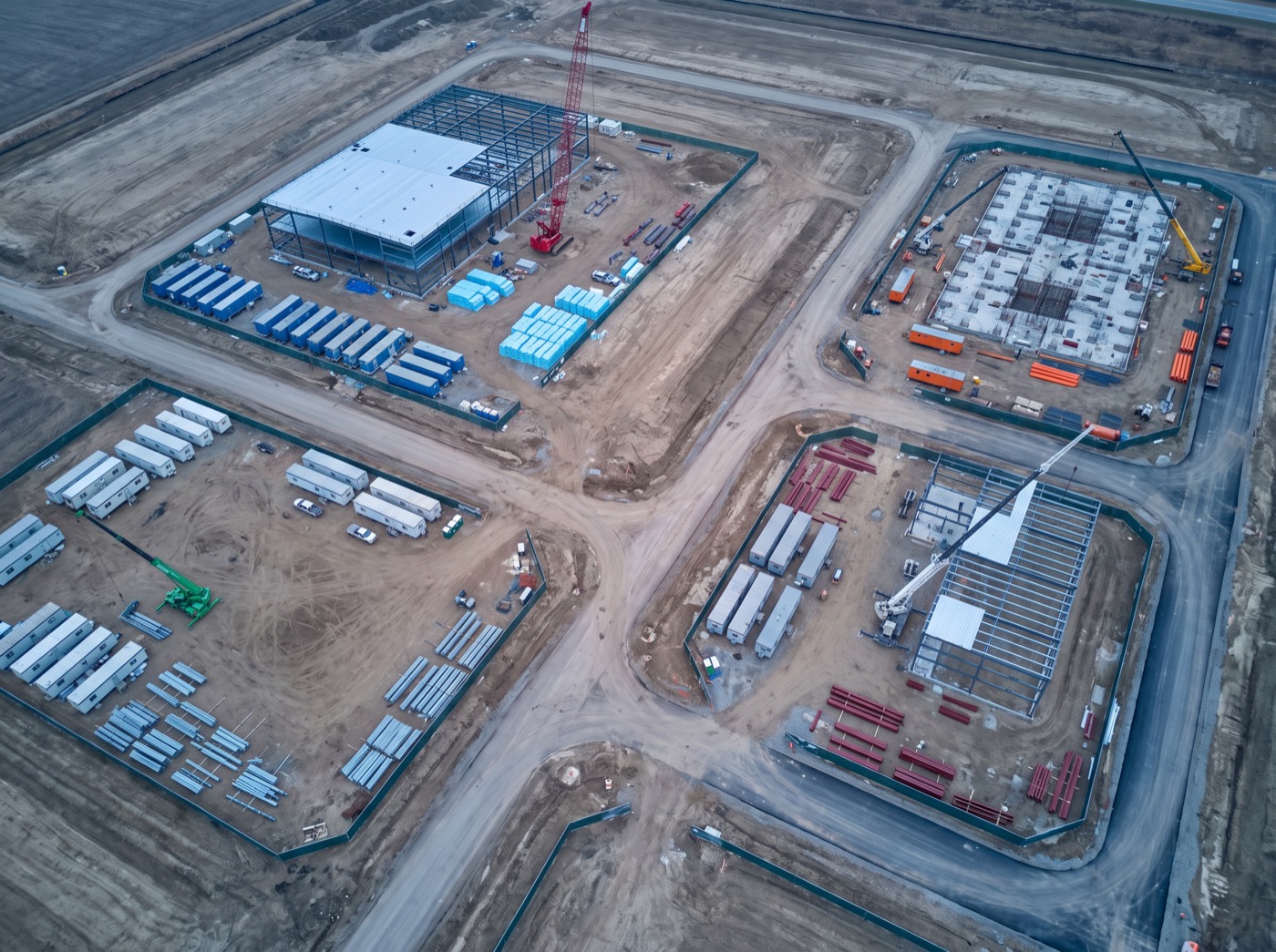 A large construction site divided between separate contractors